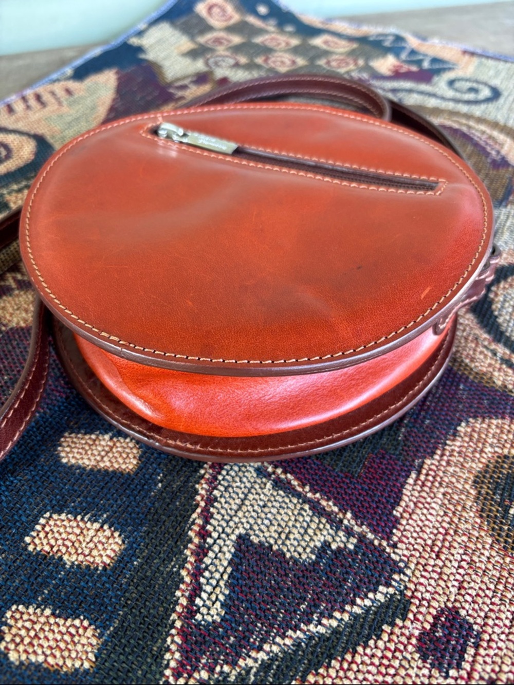 Round Leather Crossbody Bag in Cherry Red by Cuoieria Fiorentina